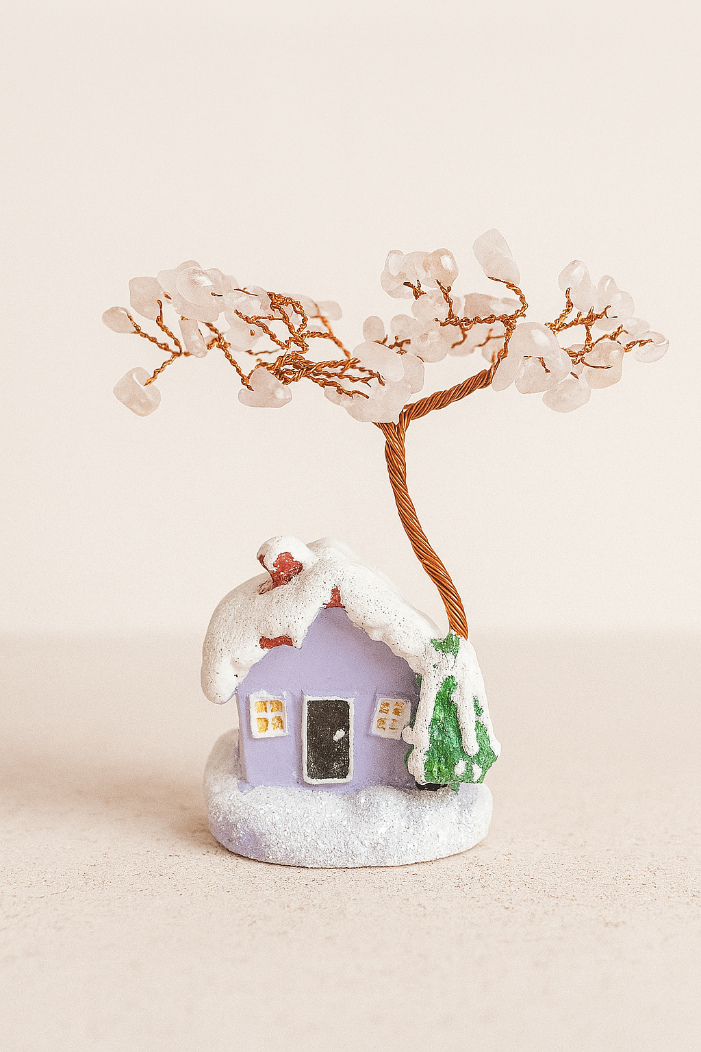 rose quartz tree with house